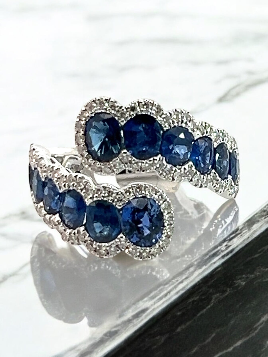 Blue Sapphire bypass ring with diamonds