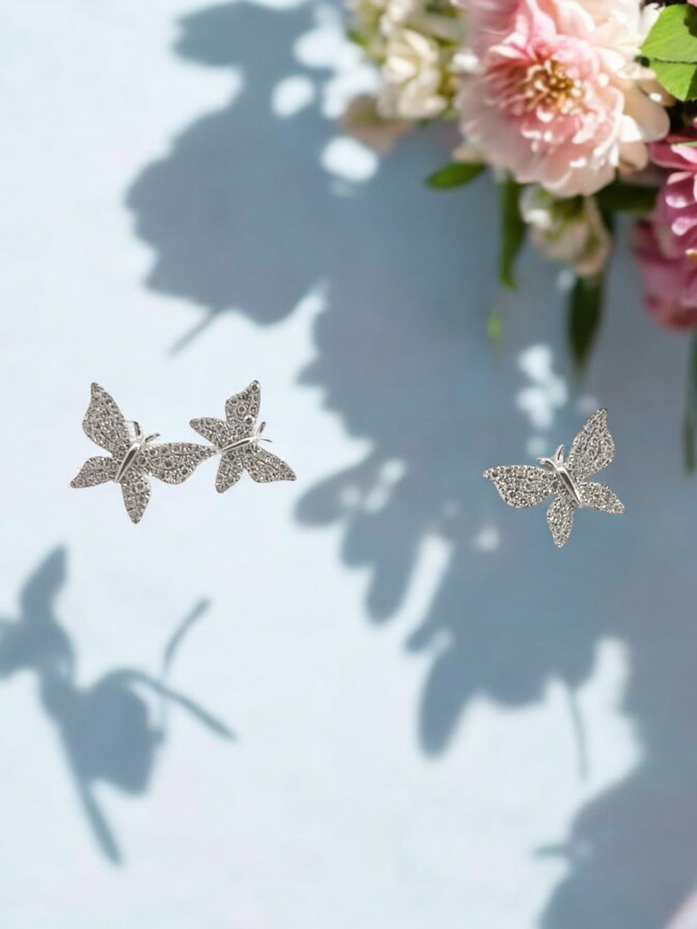 Butterfly studs flying away